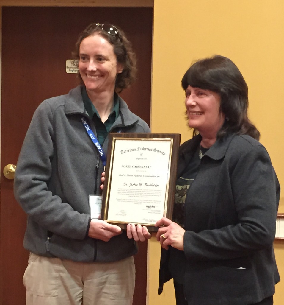 Dr. JoAnn Burkholder, 2015 Fred A. Harris Fisheries Conservation Award Recipient receiving her award from Ms. Brena Jones, NC AFS Chapter President.