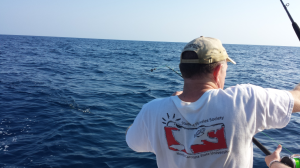 Neil Medlin supports our Chapter and Student Subunit with donated fishing trips — and also wears them on his back!