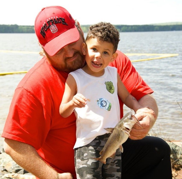 A Group Of Boys Fishing In A River Photograph by Corey Rich - Fine